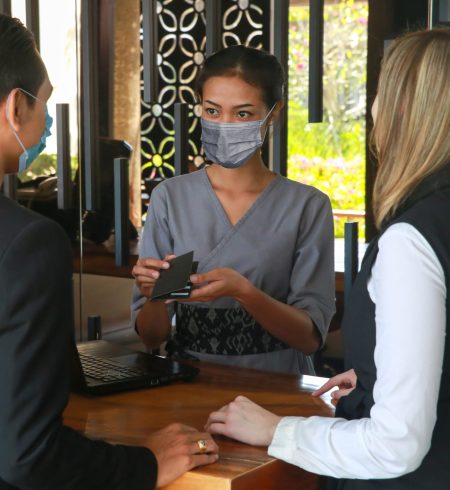 Hospitality professional welcoming guests
